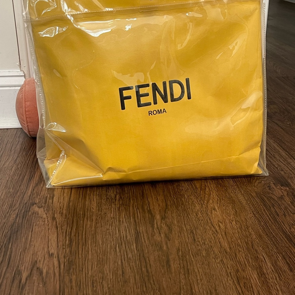 Fendi Shopping bag in Totery Bag. Authentic Fendi bag from New Orleans Saks.